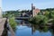 View of traditional red brick houses and river in Sheffield