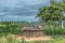 View of traditional village, house thatched with roof and terracotta and straw walls