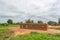 View of traditional village, thatched and zinc sheet on roof houses and terracotta brick walls