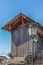 View of traditional wooden warehouse to store corn, retro street lamp on scene