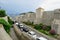 A view of traffic gridlock heading past the old town and Walls of Dubrovnik in Dubrovnik, Croatia.