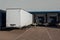 View of trailers in front of loading doors at a warehouse