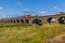 A view of a train crossing the Fourteen Arches viaduct near Wellingborough UK