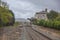 View of train line, rainy day, Obidos train station as background