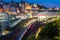 View of a train in motion leaving a train station at night