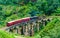 View on Train passing over Nine Arches Bridge in Ella, Sri Lanka