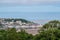 View through trees over Appledore village and Taw Torridge Estuary, North Devon.