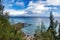 View through the trees at Slaughterhouse bay and sistant Molokai.