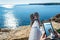 view trekking feet doing on cliff in front of the sea.panoramic landscape vacation concept,foot photography hiking relax