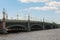View of the Troitskiy Trinity Bridge in the spring warm sunny day
