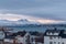 View on Tromso and surrounding mountains at dusk during polar ni