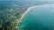 View of tropical coastline and fisherman village