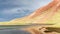 View of Tulpar Kul lake in Kyrgyzstan during the storm