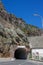 View of tunnel in mountain - entrance to Koman Lake, Albania