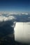 View of the turbine airplane, clouds and the Earth