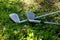 View of two golf clubs on grass