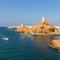 View of two watchtowers and lighthouse in Sur, Oman