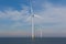 View of two windturbines in the Dutch Noordoostpolder, Flevoland and the IJsselmeer, near the town of Urk.