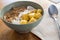 View of typical brazilian açaí bowl with cereals, coconut and pineapple