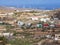 View of a typical landscape in the south of Tenerife. In the middle are small settlements with colourful Canarian houses