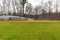 View of typical nondescript high school softball clay infield looking from outfield