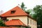 A view of typical Prague house with red tile roof