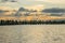 View of U-Bein bridge, built of teak wood, during sunset, in Taungthaman Lake near Mandalay, Burma