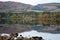 View of Ullswater in the Autumn reflected in the lake, Lake District, Cumbria UK