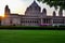 View of the Umaid Bhawan palace and hotel against a setting sun in Jodhpur, Rajasthan, India. This elegant hotel in a grand