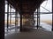 View underneath blackpool north pier showing the metal supporting structure and columns