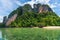 View of an uninhabited tropical island with a sandy beach in Thailand