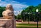 View from Union Station at Columbus Circle to the US Capitol building in Washington D.C. - Big Lion sculpture in front.