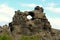 The view of the unique rock structure and the cave at Dimmuborgir Lava Formations near Lake Myvatn, Iceland