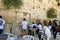 View of unknowns people praying front the Western wall in the old city of Jerusalem