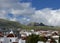 View of unspoiled mountains from the roofs of houses in Spain