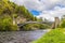 A view up the River Spey towards the castellated tower bridge at Craigellachie, Scotland