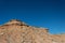 View up a rocky ridge, Chihuahuan desert, American southwest landscape, deep blue sky