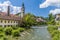 A view up the Selca Sora river past the weir in the old town of Skofja Loka, Slovenia