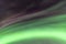 View up at Strong Northern Lights and atmospheric phenomenon `STEVE` meets each other. Steve appears as a purple and green light