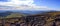 View of the Ural Mountains. Stunning panorama of the Northern Urals. Kurmnik, valleys and blue sky with beautiful clouds before