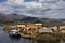 View of Uros floating islands with typical boats, Puno, Peru