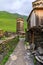 View of the Ushguli village at the foot of Mt. Shkhara. Picturesque and gorgeous scene. Rock tower towers and old houses