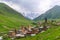 View of the Ushguli village at the foot of Mt. Shkhara. Picturesque and gorgeous scene. Rock tower towers and old houses