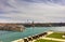 View on Valletta Grand harbor from the historic Upper Barraka garden area in Malta with historic line of cannons-Saluting Battery