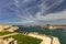 View on Valletta Grand harbor from the historic Upper Barraka garden area in Malta with historic line of cannons-Saluting Battery