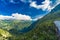 View of the valley behind Emosson Dam and Mont-Blanc peak on horizon near Swiss village of Finhaut