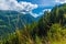 View of the valley behind Emosson Dam and Mont-Blanc peak on horizon near Swiss village of Finhaut