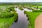 View of the valley of Lake Ogublyanka and dacha buildings along its banks, picturesque aerial view