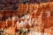 View on valley with red, orange ,white color sedimentary sharp tower like  rocks hoodoos