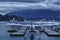 View of Vancouver Harbour Flight Centre. Seaplanes on the water with a dark clouds background